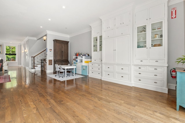 2429 W Belden Ave, Chicago, IL 60647 - foyer entrance featuring light wood finished floors, stairway, ornamental molding, and recessed lighting