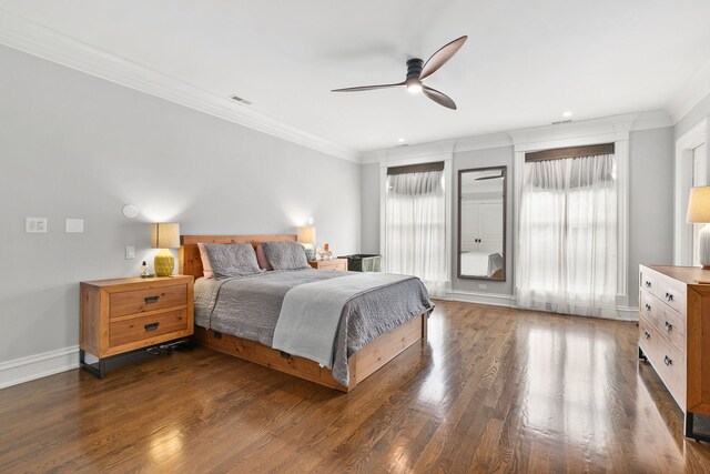 2429 W Belden Ave, Chicago, IL 60647 - bedroom with ornamental molding, dark wood-type flooring, and ceiling fan