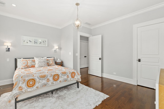 2429 W Belden Ave, Chicago, IL 60647 - bedroom featuring dark wood-style flooring and ornamental molding