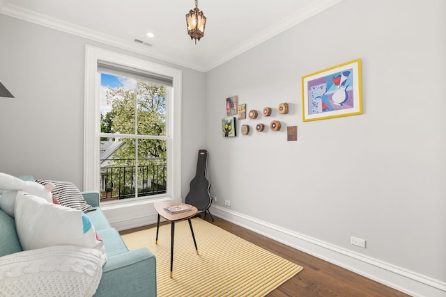 2429 W Belden Ave, Chicago, IL 60647 - sitting room with wood finished floors, ornamental molding, and recessed lighting