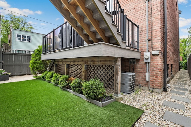 2429 W Belden Ave, Chicago, IL 60647 - back of property featuring brick siding and a wooden deck