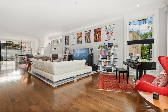 2429 W Belden Ave, Chicago, IL 60647 - living area featuring ornamental molding, a chandelier, wood finished floors, and recessed lighting