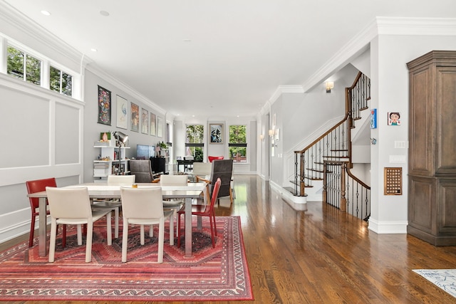 2429 W Belden Ave, Chicago, IL 60647 - dining space featuring wood finished floors, stairs, and ornamental molding