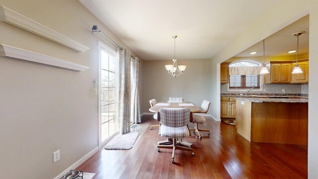 4005 Pebblebrook Ln, Champaign, IL 61822 - dining area featuring a chandelier, dark wood-style floors, and recessed lighting