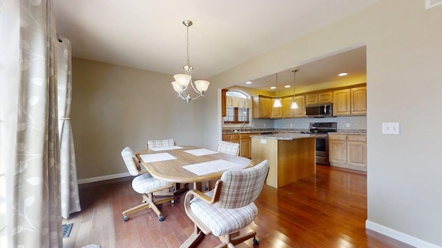 4005 Pebblebrook Ln, Champaign, IL 61822 - dining room featuring wood finished floors and a chandelier