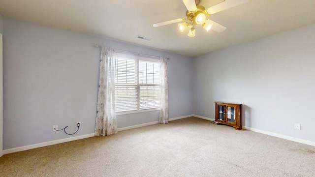 4005 Pebblebrook Ln, Champaign, IL 61822 - carpeted spare room featuring baseboards and a ceiling fan