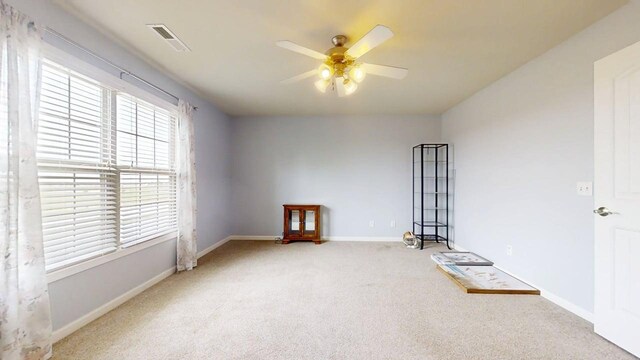 4005 Pebblebrook Ln, Champaign, IL 61822 - empty room featuring carpet floors and ceiling fan