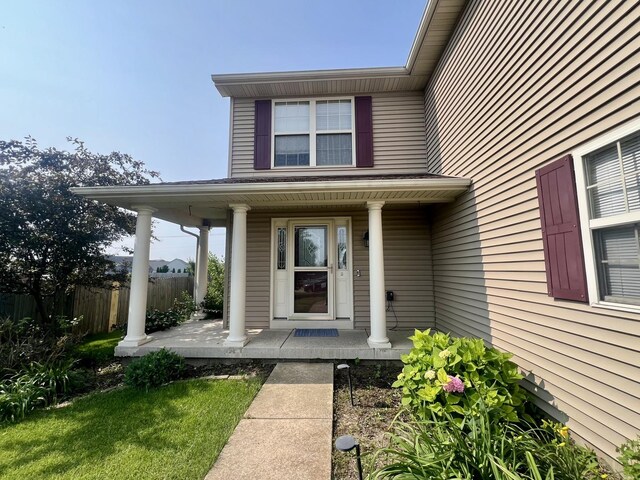 4005 Pebblebrook Ln, Champaign, IL 61822 - view of exterior entry featuring a porch
