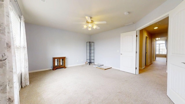 4005 Pebblebrook Ln, Champaign, IL 61822 - carpeted empty room featuring a ceiling fan and a smoke detector