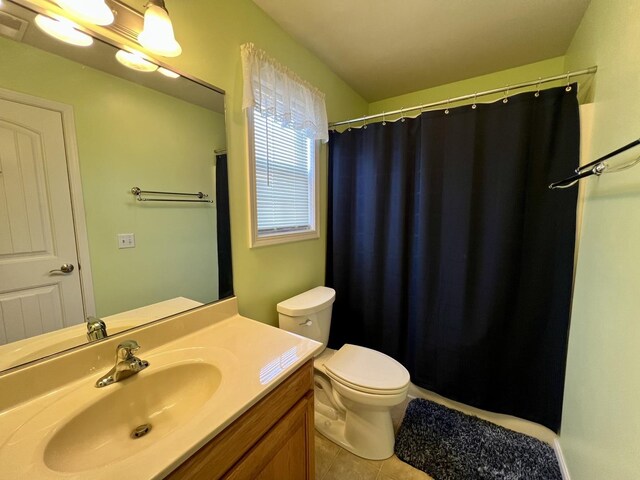 4005 Pebblebrook Ln, Champaign, IL 61822 - bathroom featuring vanity, tile patterned flooring, and a shower with curtain