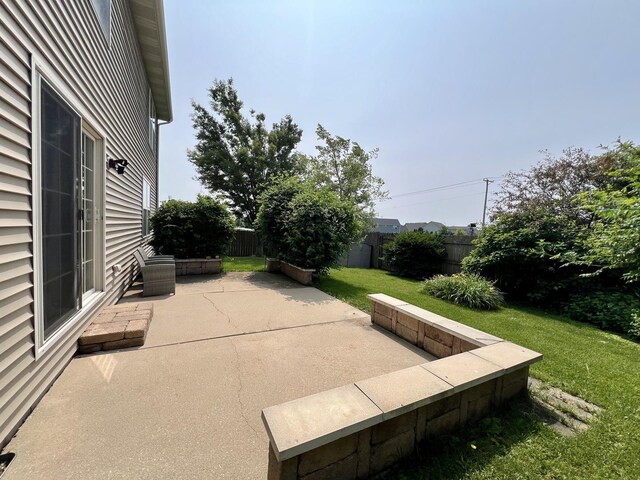 4005 Pebblebrook Ln, Champaign, IL 61822 - fenced backyard featuring a patio area
