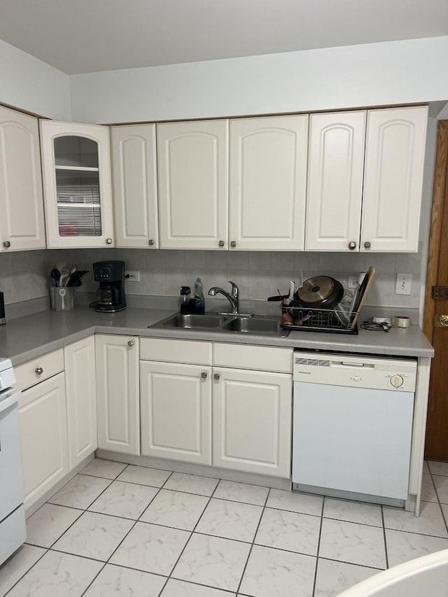 7020 W Diversey Ave Unit 3, Chicago, IL 60707 - kitchen with white dishwasher, light marble finish floors, a sink, and white cabinetry