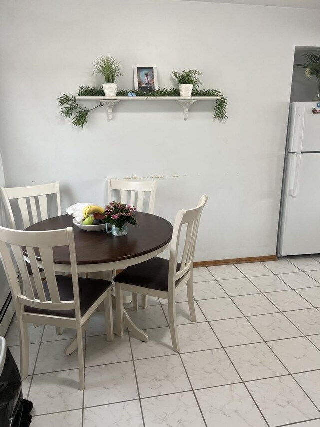 7020 W Diversey Ave Unit 3, Chicago, IL 60707 - dining area with baseboards