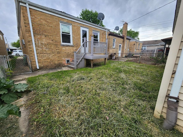 7112 W Farragut Ave, Chicago, IL 60656 - rear view of house with brick siding