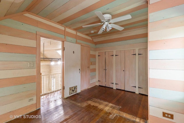 34140 N Hickory Ave, Grayslake, IL 60030 - foyer with lofted ceiling, dark wood-style floors, a ceiling fan, and wooden walls