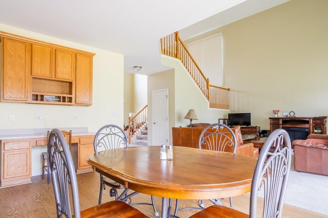 400 Bower Ln, Oswego, IL 60543 - dining space featuring stairs and light wood-type flooring