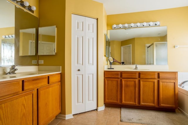 400 Bower Ln, Oswego, IL 60543 - full bathroom with a shower stall, vanity, tile patterned flooring, and a closet