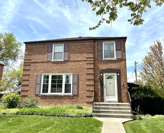 1140 Blanchan Ave, La Grange Park, IL 60526 - view of front facade with brick siding and a front yard