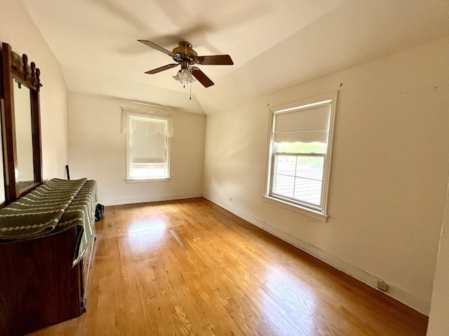 1140 Blanchan Ave, La Grange Park, IL 60526 - unfurnished living room featuring light wood-style floors, a ceiling fan, and baseboards