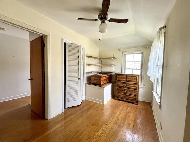1140 Blanchan Ave, La Grange Park, IL 60526 - bedroom with wood-type flooring, a closet, vaulted ceiling, baseboards, and a ceiling fan