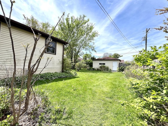 1140 Blanchan Ave, La Grange Park, IL 60526 - view of grassy yard featuring an outdoor structure