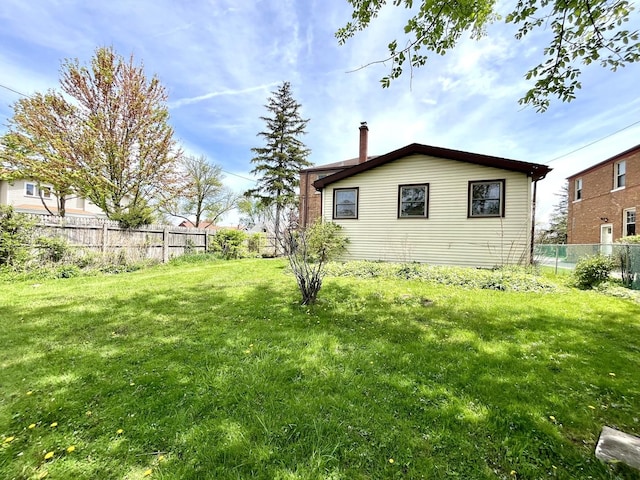 1140 Blanchan Ave, La Grange Park, IL 60526 - back of house featuring a chimney