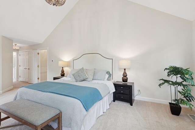 415 Fuller Rd, Hinsdale, IL 60521 - bedroom with light colored carpet, baseboards, and high vaulted ceiling