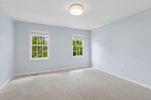 415 Fuller Rd, Hinsdale, IL 60521 - carpeted spare room featuring baseboards