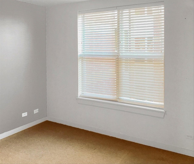 2231 W Maypole Ave Unit 201, Chicago, IL 60612 - carpeted spare room featuring baseboards