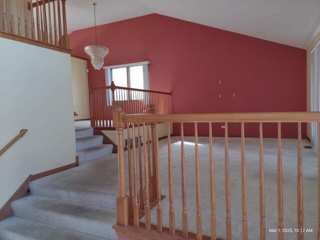 41 Manor Dr, Matteson, IL 60443 - stairway with carpet floors, vaulted ceiling, and a chandelier