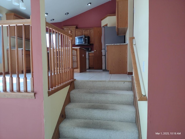 41 Manor Dr, Matteson, IL 60443 - staircase featuring lofted ceiling, tile patterned floors, and recessed lighting