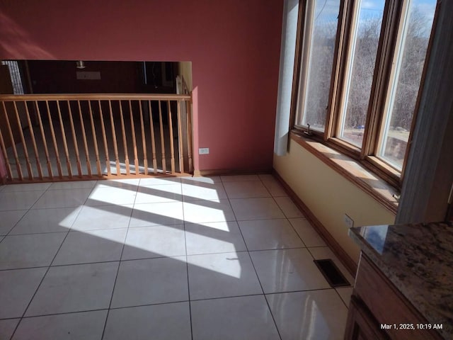 41 Manor Dr, Matteson, IL 60443 - spare room with light tile patterned floors and baseboards
