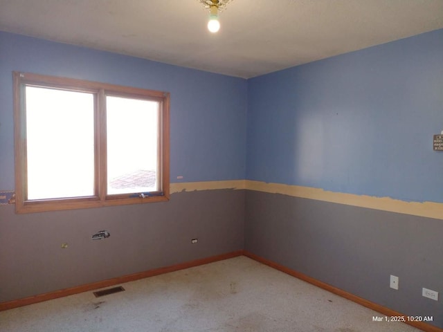 41 Manor Dr, Matteson, IL 60443 - carpeted empty room featuring plenty of natural light and baseboards