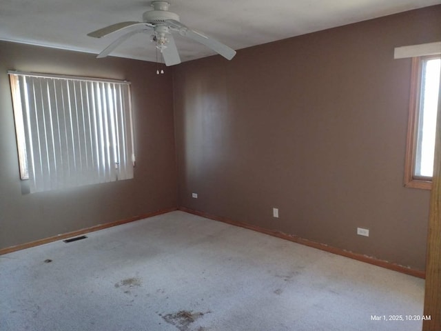 41 Manor Dr, Matteson, IL 60443 - unfurnished room with plenty of natural light, a ceiling fan, and carpet