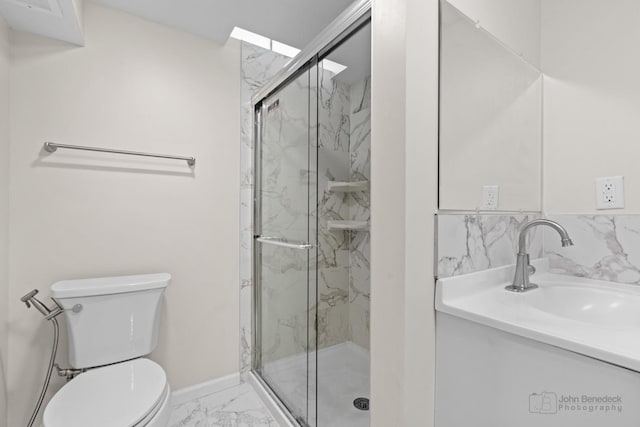 634 Primrose Ln, Schaumburg, IL 60194 - bathroom featuring marble look tile flooring, toilet, vanity, a marble finish shower, and baseboards