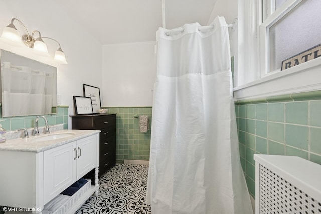 307 W Harris Ave Unit 3A, La Grange, IL 60525 - bathroom featuring tile walls, wainscoting, vanity, tile patterned floors, and a shower with shower curtain