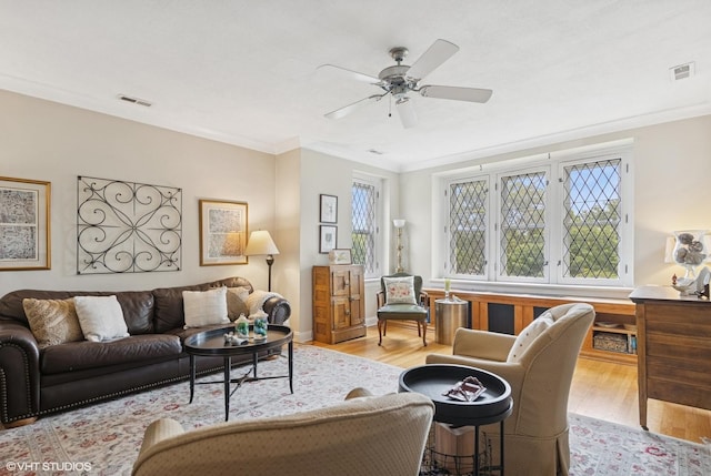 307 W Harris Ave Unit 3A, La Grange, IL 60525 - living room with wood finished floors, ornamental molding, and a ceiling fan