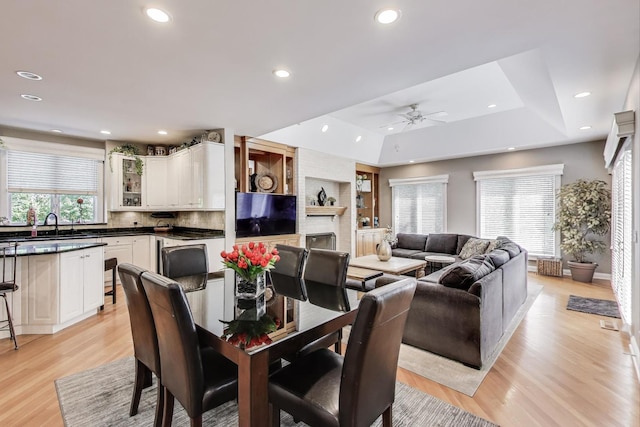 17N431 Oak Knoll Ln, Dundee, IL 60118 - dining area with ceiling fan, plenty of natural light, recessed lighting, light wood-type flooring, and a tray ceiling