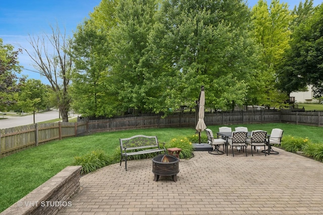 1006 Tristram Ct, West Dundee, IL 60118 - fenced backyard with an outdoor fire pit, a patio, and outdoor dining space