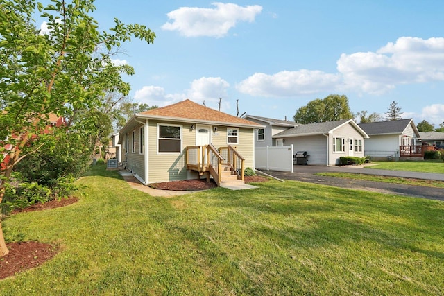 1508 N Lake Shore Dr, Round Lake Beach, IL 60073 - back of house featuring driveway