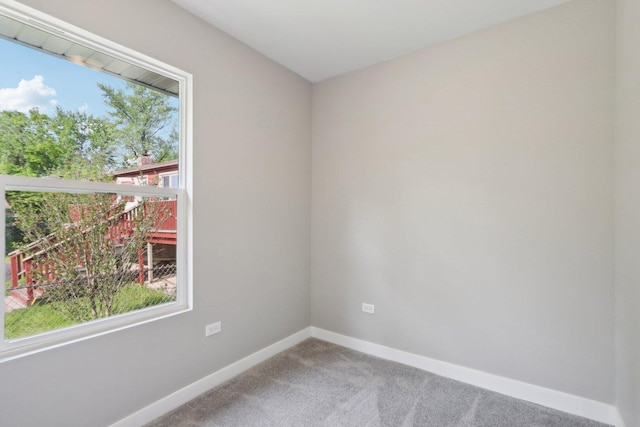 1508 N Lake Shore Dr, Round Lake Beach, IL 60073 - carpeted spare room featuring baseboards