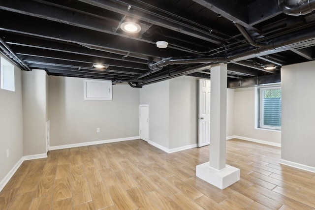 1508 N Lake Shore Dr, Round Lake Beach, IL 60073 - below grade area featuring wood finished floors and baseboards