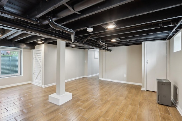 1508 N Lake Shore Dr, Round Lake Beach, IL 60073 - basement with wood finished floors and baseboards