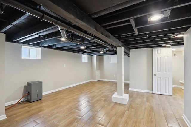 1508 N Lake Shore Dr, Round Lake Beach, IL 60073 - below grade area featuring light wood-style floors and baseboards