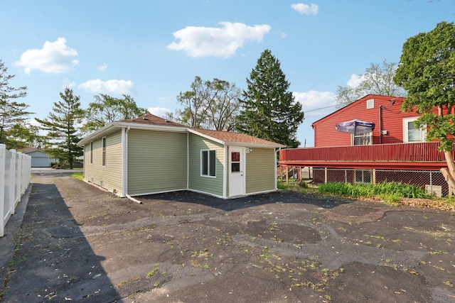 1508 N Lake Shore Dr, Round Lake Beach, IL 60073 - back of house with a wooden deck and an outdoor structure