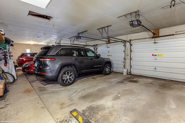 5008 W 122nd St Unit 2B, Alsip, IL 60803 - garage featuring a garage door opener