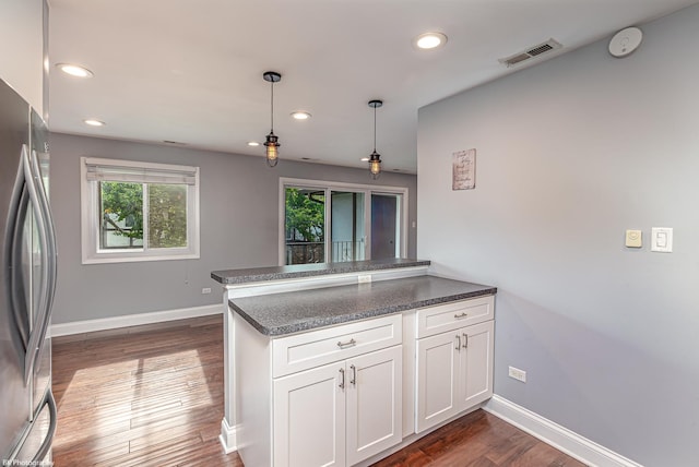 5008 W 122nd St Unit 2B, Alsip, IL 60803 - kitchen with freestanding refrigerator, a peninsula, baseboards, healthy amount of natural light, and recessed lighting