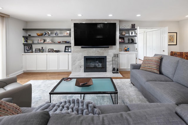 1452 Hemlock Knoll Ter, Northbrook, IL 60062 - living room with light wood-style flooring, a fireplace, and recessed lighting