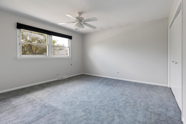 1452 Hemlock Knoll Ter, Northbrook, IL 60062 - spare room featuring ceiling fan, carpet, and baseboards