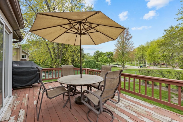1452 Hemlock Knoll Ter, Northbrook, IL 60062 - wooden terrace with outdoor dining area, a lawn, and area for grilling